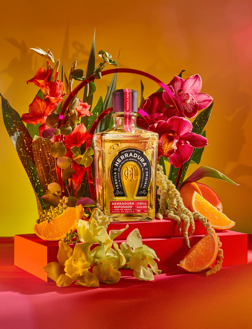 Tequila Herradura Reposado on a botanical backdrop